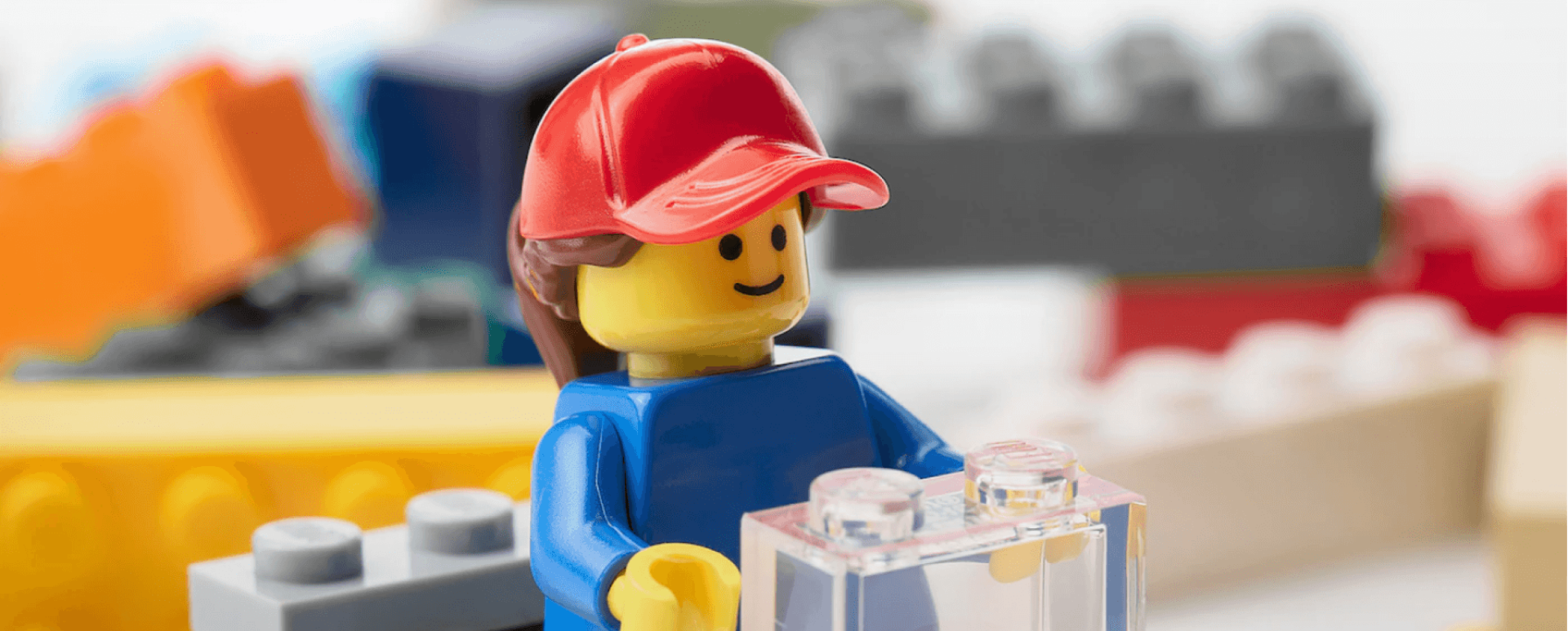 Lego builder figure with a toolbox